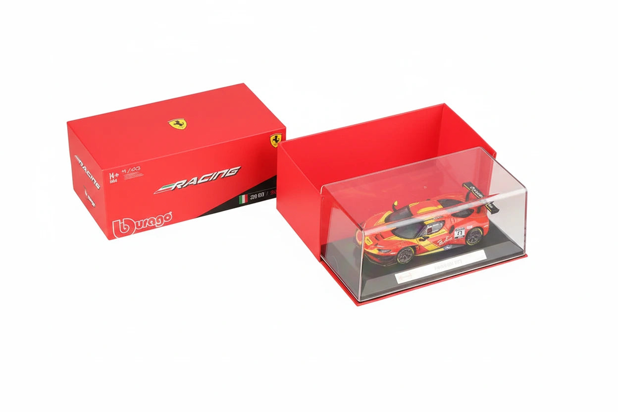 Red racing car model in a clear display case with a matching red box